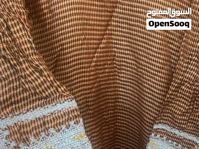 ملابس  عمانيه