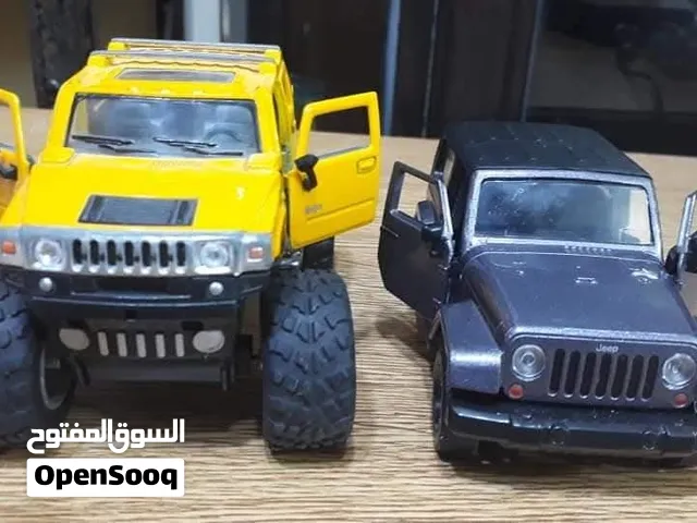 مجسمات رانجلر و بكم همر حديد امريكي قياس 1/32 بفتحوا ابواب  20 دينار