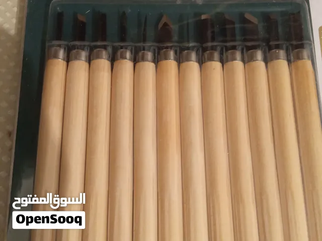 اداوت نحت علي الخشب الطين