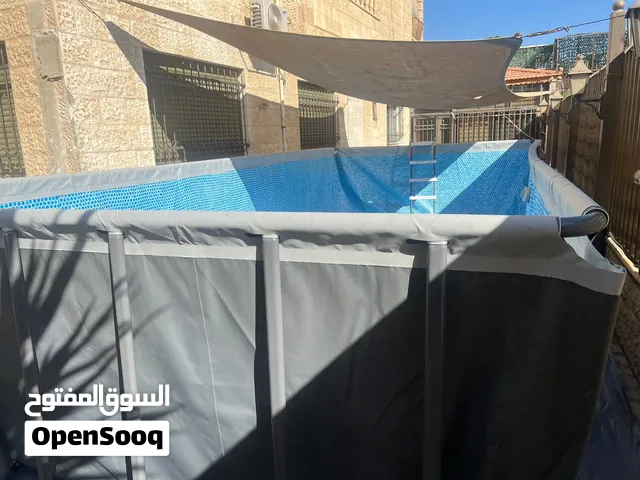 خدمة تنظيف برك السباحة التركيب والبرك البناء تعقيم فك تركيب نقل تخزين