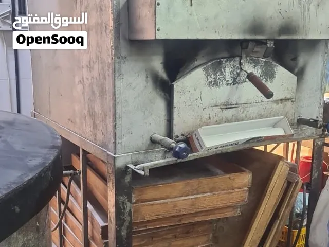 فرن حجري و مكينة عجين الكنافة  مستخدمة استخدام بسيط