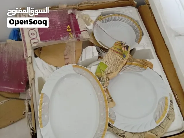 طقم صيني ابيض فى ذهبى فتحى محمود
