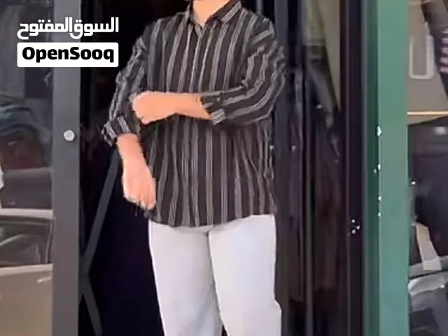 قميص جديد بتصميم واسع (أو قميص جديد مقاس واسع / أوفر سايز)