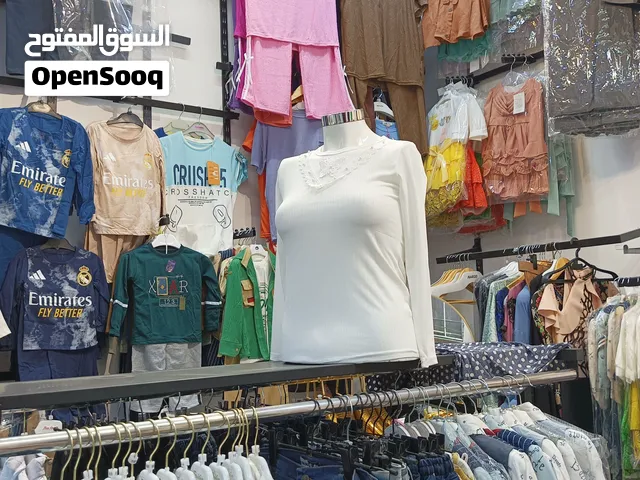 محل ملابس نسائي واولاد