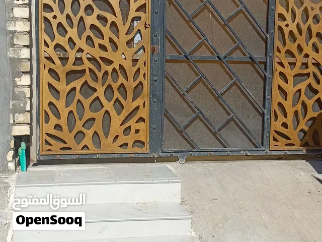 بيت للبيع بغداد المحموديه حي الشهداء طابقين مدخلين الواجهه 10 متر نزال 14