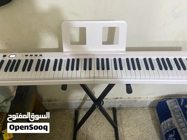 جيتار ياماها c40 بيانو بي اكس 20 وستاتد