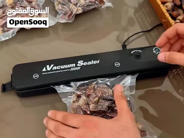 جهاز شفط وتغليف التمور والاكياس الخاصه بهن