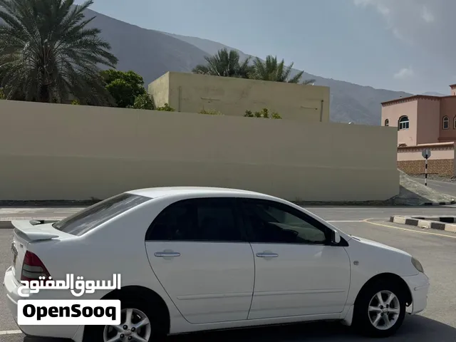تويوتا كورولا 2004 GLI صالون سيدان بحالة ممتازة مع شاشة وكاميرا خلفية