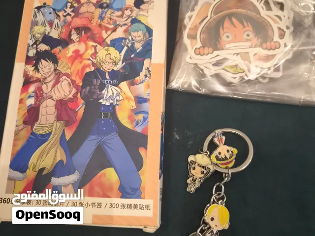 علب ملصقات انمي ،مع سلاسل مفاتيح اصليه
