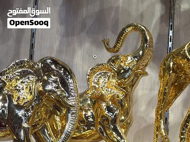 تحف نثريات انتيكات تحف الوان مختلفة ذهبي فضي عاجي بني تحف علو شكل خيول فيل صقر جمل احجام مختلفة