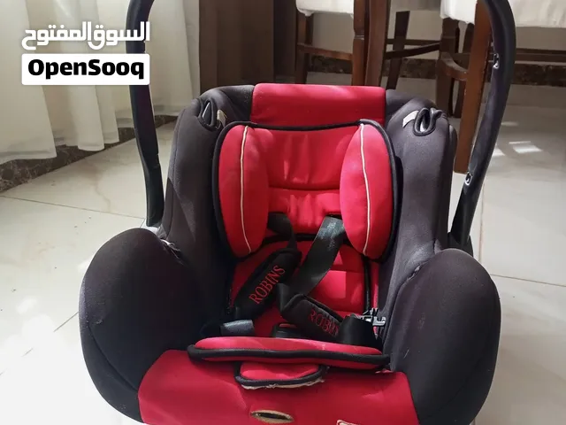 كارسيت عدد ( 2 ) ، سرير بيبي ، هزازة ، كراجة مع العاب و بيانو، كرسي طعام