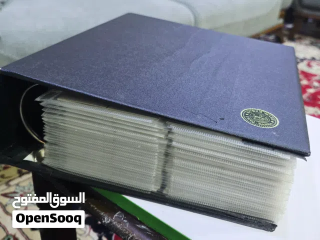 للبيع ألبوم نادر يضم 25 صفحة كاملة من العملات المعدنية المتنوعة، عربية وأجنبية، من عدة دول