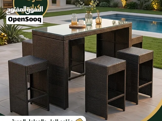 طقم جلسة بار خارجية مرتفعه بتصميم مودرن مكونه من طاوله وستة كراسي