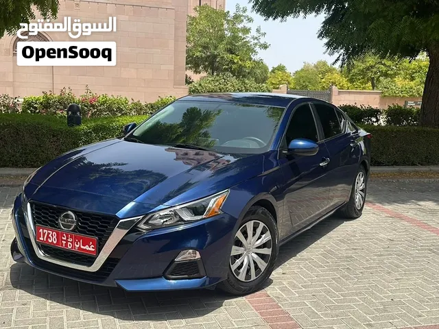 Nissan altima  and corolla