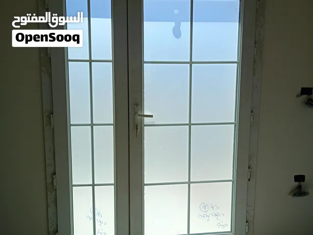 زجاج عاكس مزدوج