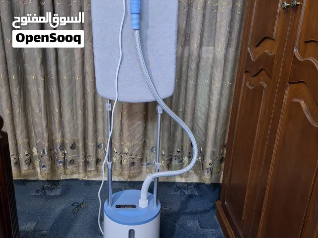 مكواة عمودي