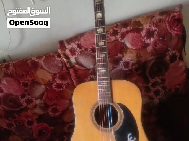 نوع جوهر خليفة جيتار نوع ياباني عود صناعة سورية شبه جديد بالاضافة الي حقيبة عود