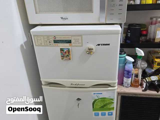 ثلاجة حجم وسط