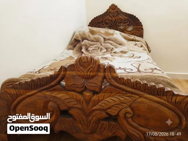 Sharing bed space available in a small studio for a bachelor.