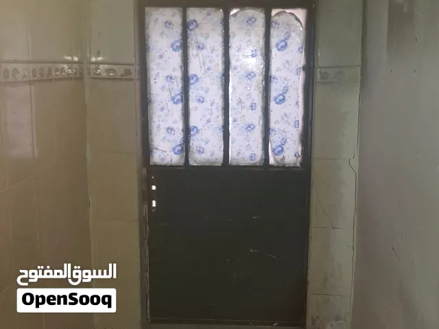 ابواب صاج وحديد وشبابيك المنيوم مع الجام وتانكي ماء طن و2طن ونص طن
