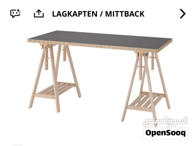 Table from ikea for sale and it used very  very light but the top are wood
