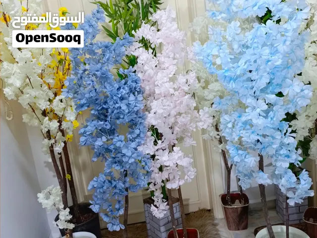 أشجار صناعي بجذع طبيعي شامل القوار
