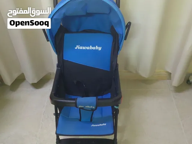 عربة أطفال مستعملة