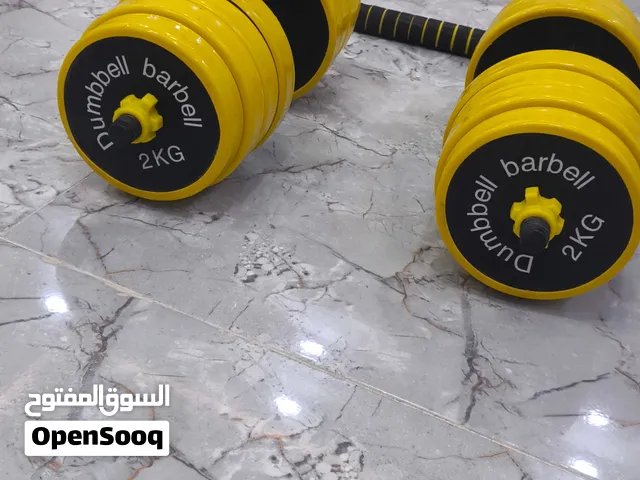 دمبلصات 2 وزن الواحد 22كيلو تقريباً وياهن بار ويرهمن اغلب التمارين
