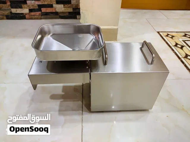 مكينة عصر الزيت