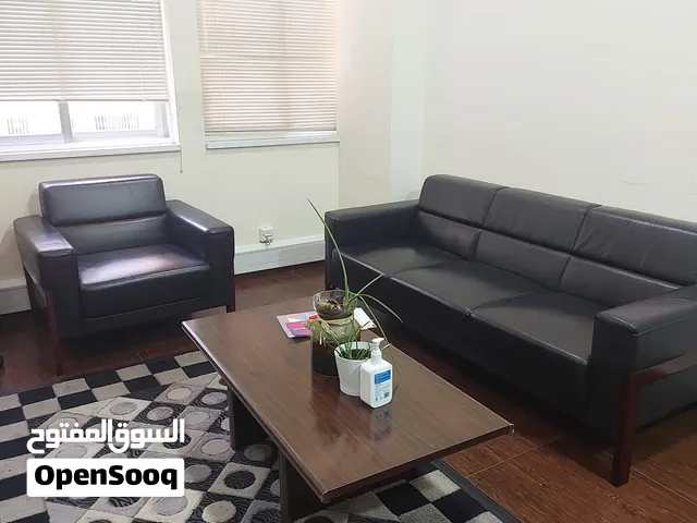 used Leather good quality 5 seater sofa set with table for 80 BD only
