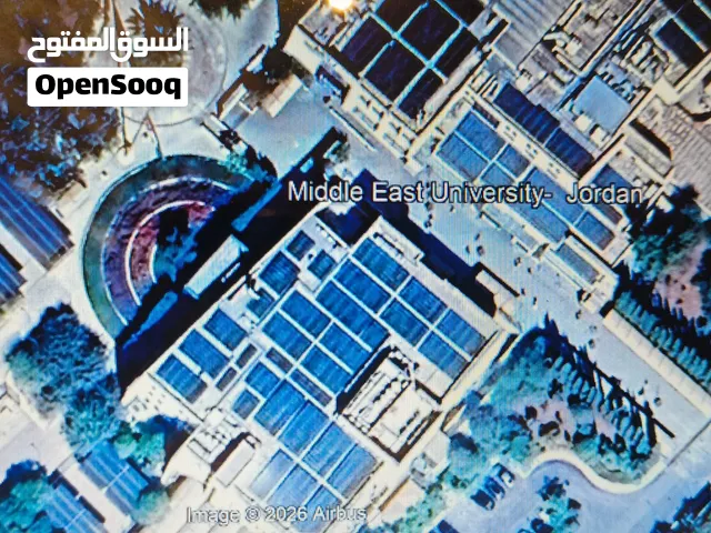 ارض للبيع مقابل جامعة الشرق الأوسط على شارع الجامعه مباشره بسعر 150 دينار للمتر من المالك