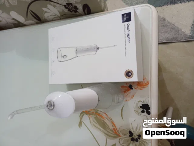 oral irrigator جهاز تنظيف الأسنان بضغط الماء