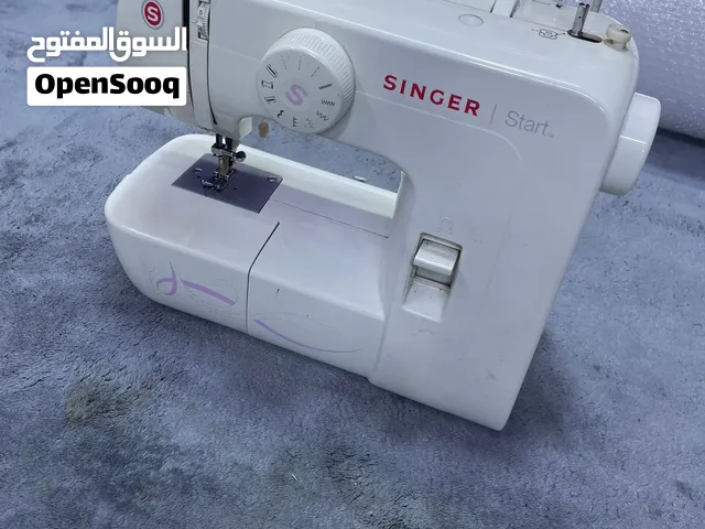 Singerماكينة خياطه.