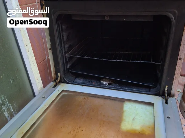 طباخة بالفرن