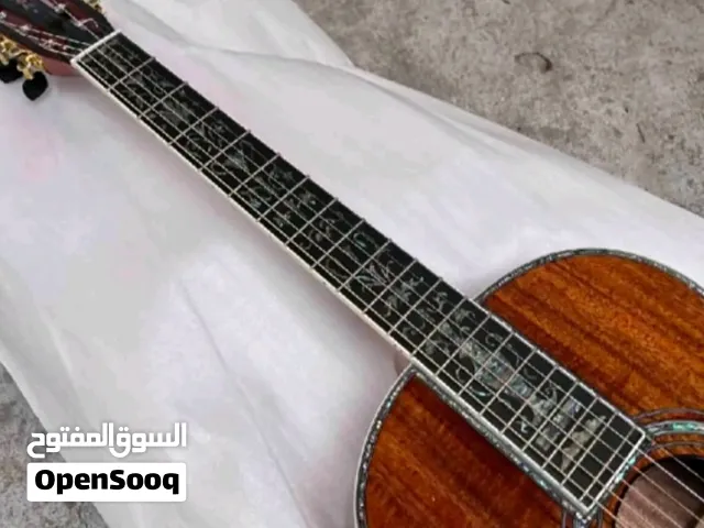 كيتار من خشب الصندل الأصلي و مزخرف بصدف البحر الطبيعي و باوتار نحاس و صوت راءع و شكل جدا جديل