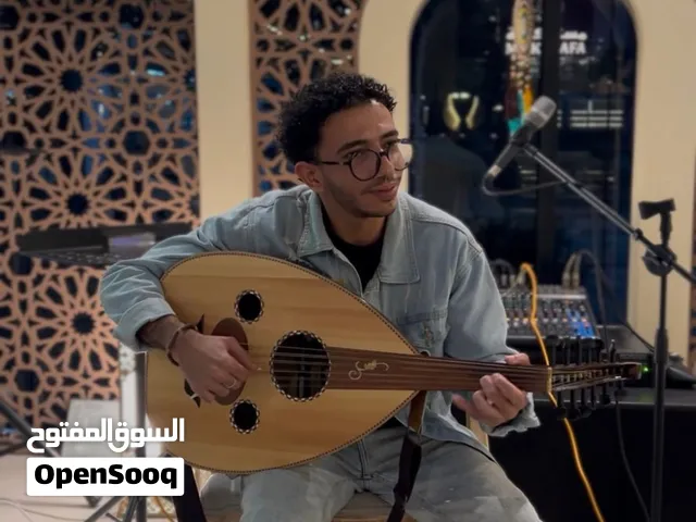 معلم موسيقي لتعليم ألة العود و الكمانجا من الصفر حتي الاحتراف