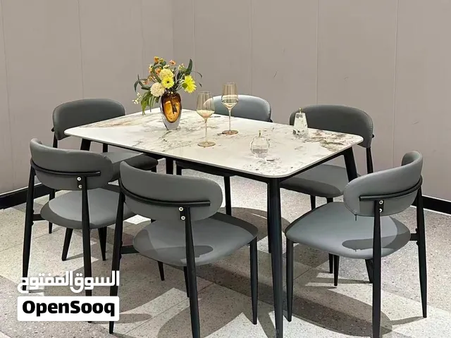 ميز طعام هيكل حديد عالي الجوده سطح مرمر كرانيت كشنات جلد قياس 140 في 80 سم سعره 395