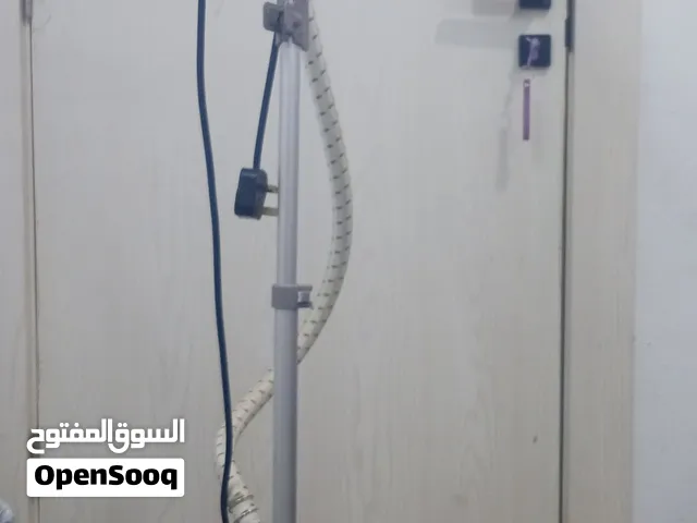 مكواة بخار عامودية