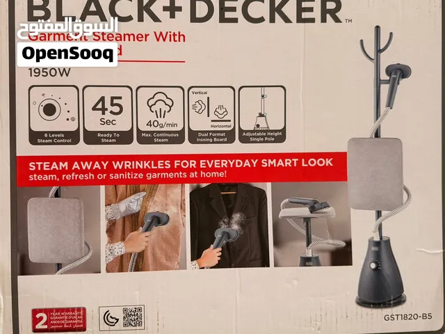 Garment steamer with ironing board. Black + Decker. Good quality. Just like new. Green.