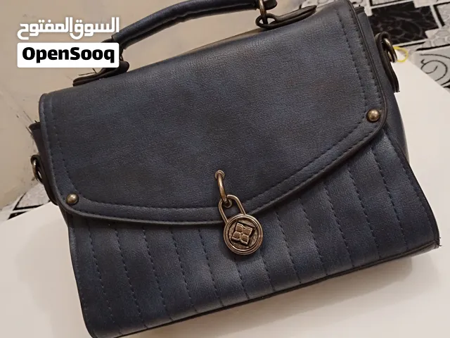 حقيبه يد بحاله جيده جدا.