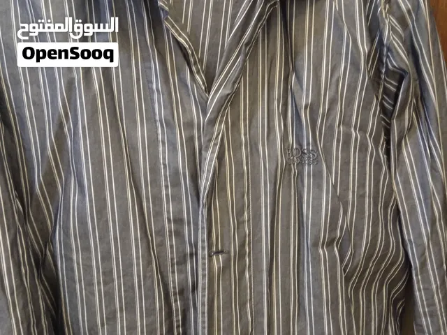 بجامة نوم بأزرار ماركة هوغو بوس قياس ميديوم بتلبس لارج لوزن 75 جديده