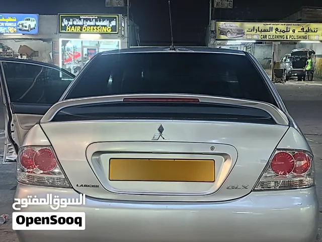 ميتسوبيشي لانسر 2007 موديل خليجي بجميلة فضي مع أنظمة أمان ومواصفات حديثة