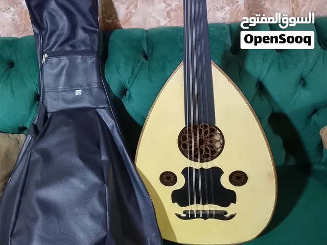 عود دمشقي للبيع مع حقيبة وريشه غير مستخدم