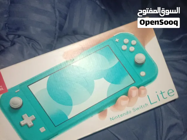 نيتيندو سويتش لايت مثل الجديد شريك قبل شهرين الجهاز ولا غلطه مع كرتونته مع الاغراض الموجوده عالصوره