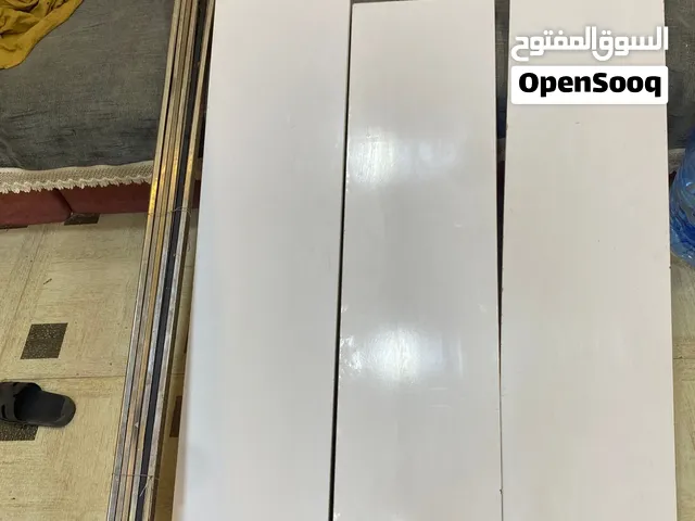 رفوف محل عدد 14 مع مساطر عدد 12