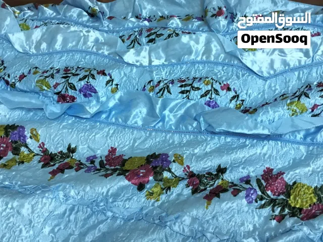 مفرش سرير مطرز