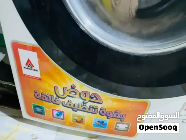غسالة ملابس وتجفيف