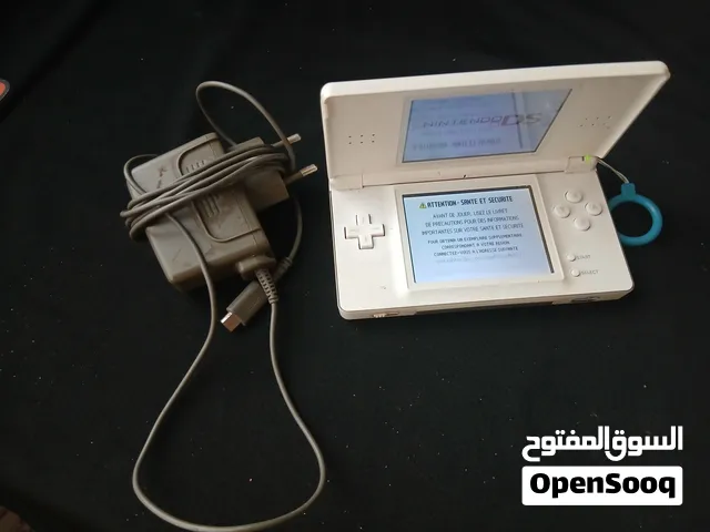 Nintendo DS Lite أبيض شغال ممتازة مع الشاحن الأصلي