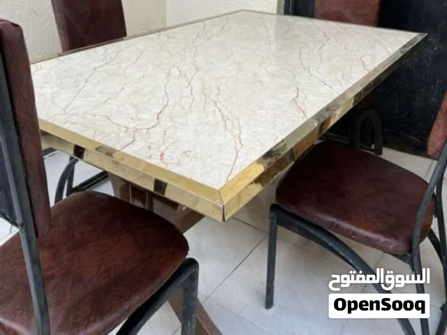 ميز طعام اربع كراسي