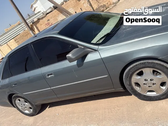 تويوتا 4 رونر موديل 2004 لون أزرق مع مواصفات أوروبية وخصائص مميزة